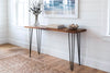 Wooden console table with metal hairpin legs.